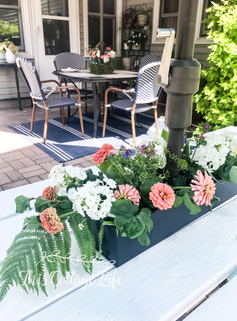 patio umbrella table flowers