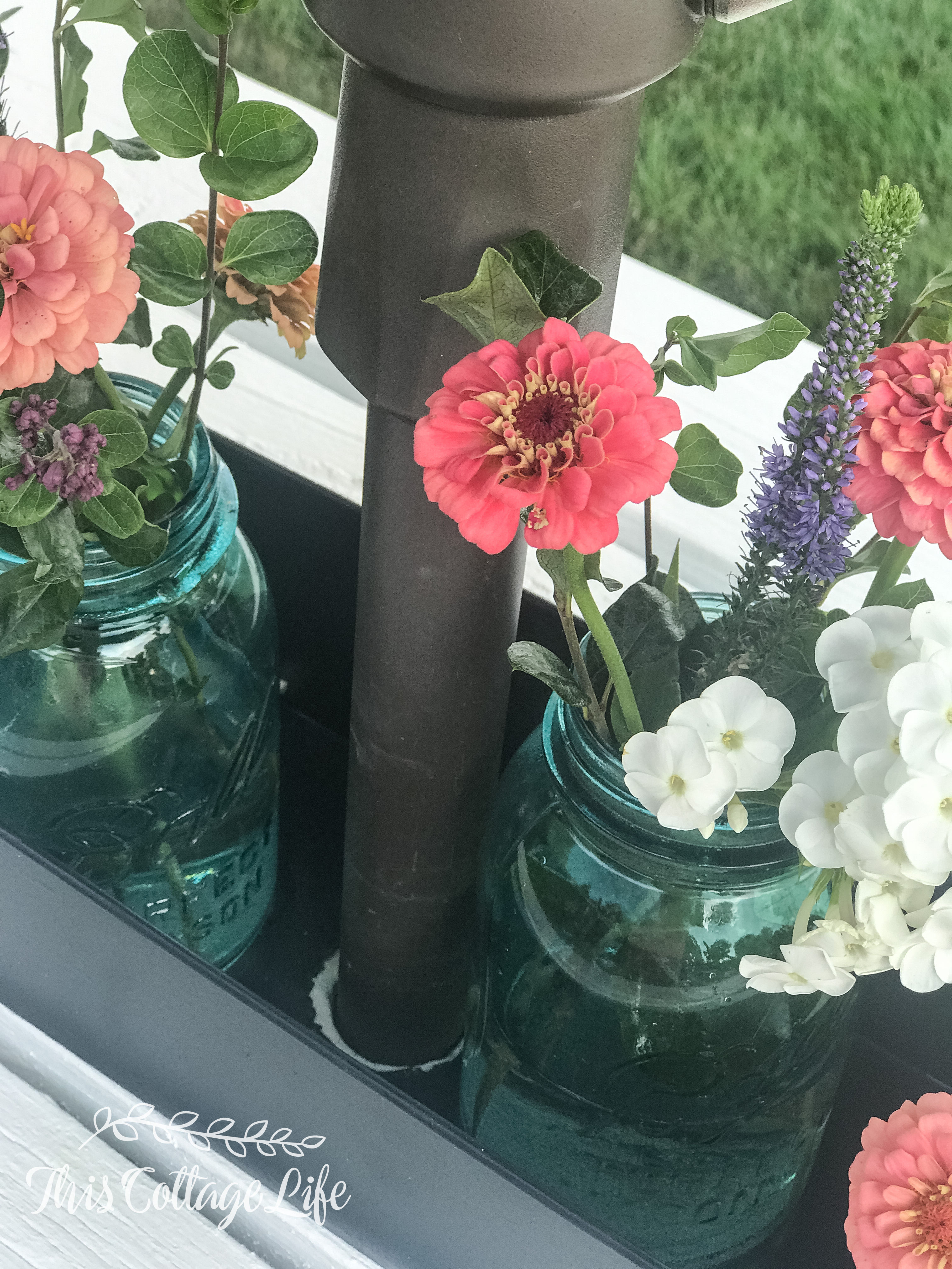 Adding A Centerpiece To A Patio Table With Umbrella This Cottage Life